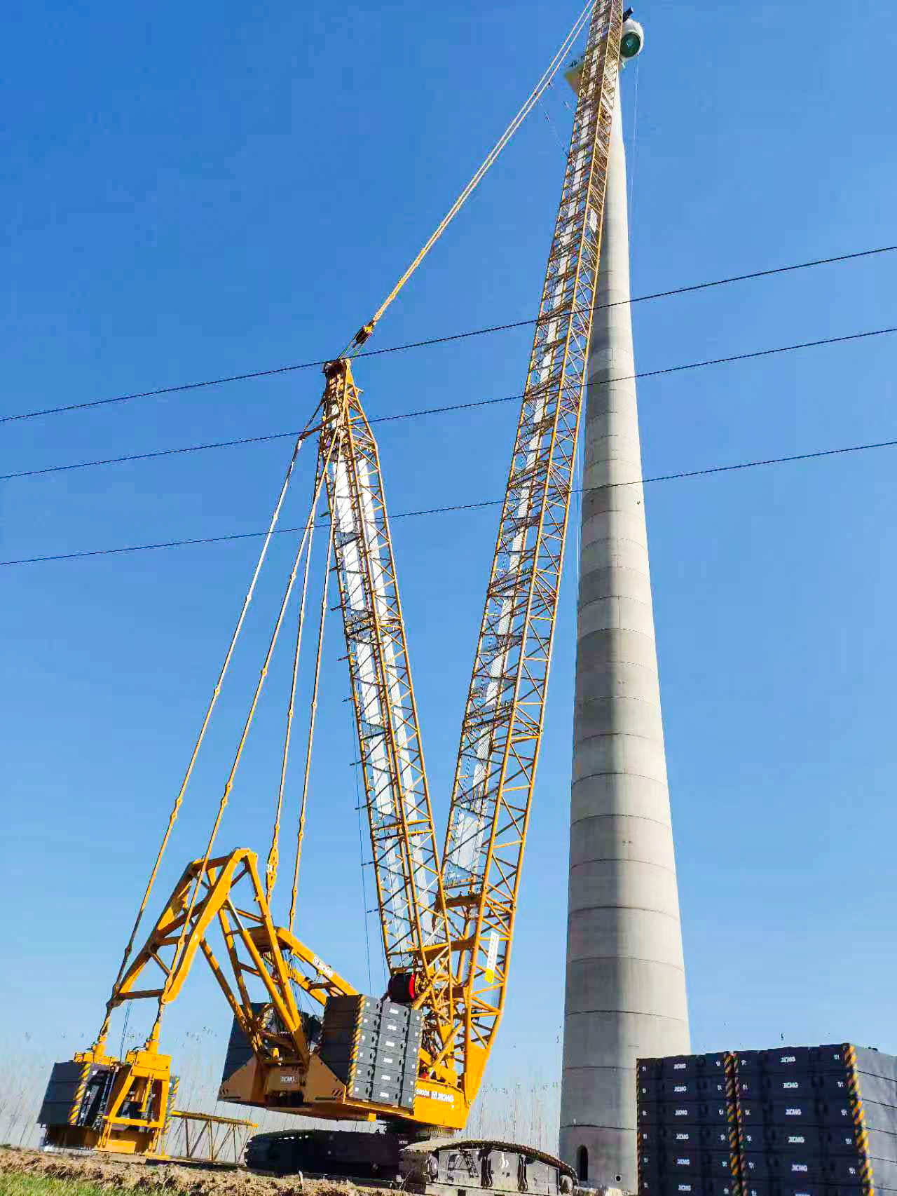 160米高空精准“搭积木”：Z6官网XLC15000M分体吊装6.25兆瓦风机全纪录